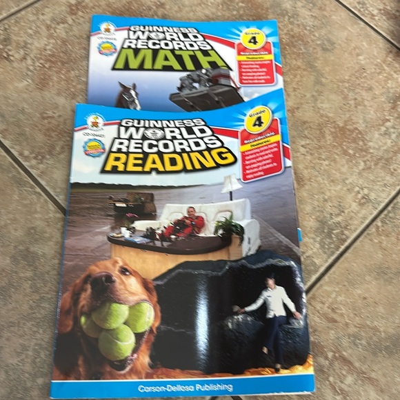 2 Carson-Dellosa Guinness World Records® Reading & Math Grade‎ 4 workbooks - Picture 1 of 7
